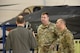 U.S. Air Force Lt. Col. Scott Gunn, 33rd Operations Support Squadron commander, left, discusses the weapons bay of an F-35A Lightning II with COL Samuel Saine, 4th Battlefield Coordination Detachment commander, center, and Sgt. Maj. Miguel Quiros, 4 BCD sergeant major, right, Jan. 26, 2017, at Eglin Air Force Base, Florida. Saine and Qurios visited the 33rd Fighter Wing while conducting a battlefield circulation analysis to engage with and evaluate Ground Liaison Officers embedded in the unit. (U.S. Air Force photo by Staff Sgt. Peter Thompson)