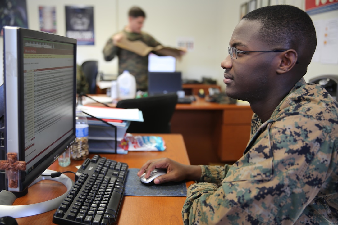 Cpl. Wilde Lariveaux works at his computer aboard Marine Corps Air Station Cherry Point, N.C., Feb. 1, 2017. Lariveaux emigrated from Haiti to the United States at the age of seven, and later went back to lend humanitarian aid after Hurricane Matthew decimated the Haitian country. Lariveaux is an administrative specialist assigned to Marine Aviation Logistics Squadron 14, Marine Aircraft Group 14, 2nd Marine Aircraft Wing. (U.S. Marine Corps photo by Lance Cpl. Cody Lemons/Released)