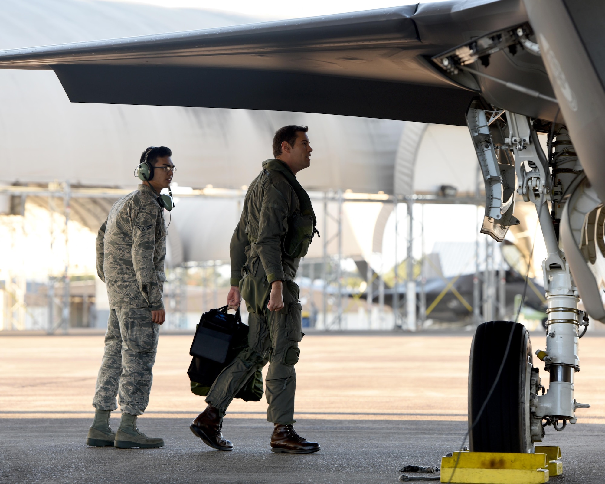U.S. Navy Lt. Cmdr. Charles Escher, Strike Fighter Squadron (VFA-101) operations officer, completes a walk-around prior to flying an Air Force F-35A Dec. 6, 2016, at Eglin Air Force Base, Florida. For only the second time at Eglin AFB, a Naval Aviator has been selected to dual qualify in the U.S. Navy’s F-35C and the Air Force’s F-35A. Escher plans to use what he learns from his experience with the 33 FW to help the F-35 enterprise grow. He looks to join a group of test pilots at Edwards AFB, California, where he will have the opportunity to be the Navy’s voice for the aircraft weapons and vehicle system development. (U.S. Air Force photo/ Staff Sgt. Peter Thompson)