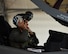 U.S. Navy Lt. Cmdr. Charles Escher, Strike Fighter Squadron (VFA-101) operations officer, dawns his helmet prior to flying an Air Force F-35A Dec. 6, 2016, at Eglin Air Force Base, Florida. For only the second time at Eglin AFB, a Naval Aviator has been selected to dual qualify in the U.S. Navy’s F-35C and the Air Force’s F-35A. Escher plans to use what he learns from his experience with the 33 FW to help the F-35 enterprise grow. He looks to join a group of test pilots at Edwards AFB, California, where he will have the opportunity to be the Navy’s voice for the aircraft weapons and vehicle system development. (U.S. Air Force photo/ Staff Sgt. Peter Thompson)