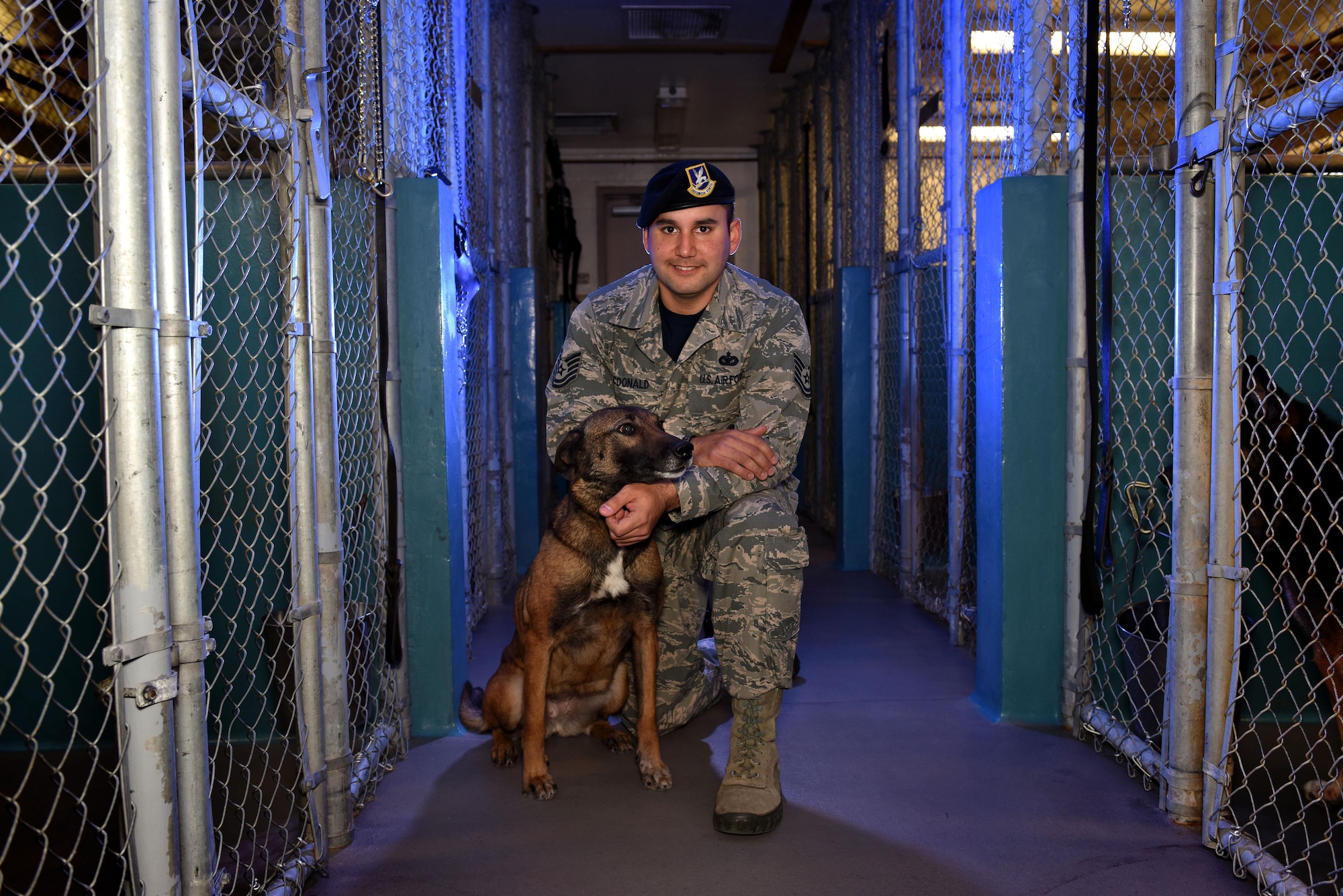 U.S. Air Force Tech. Sgt. David Macdonald, 19th Security Forces Squadron kennel master, has been a service member since 2005. Macdonald has worked with four military working dogs since becoming a dog handler. As a kennel master, Macdonald manages and monitors unit training for eight MWDs. (U.S. Air Force photo by Senior Airman Mercedes Taylor)