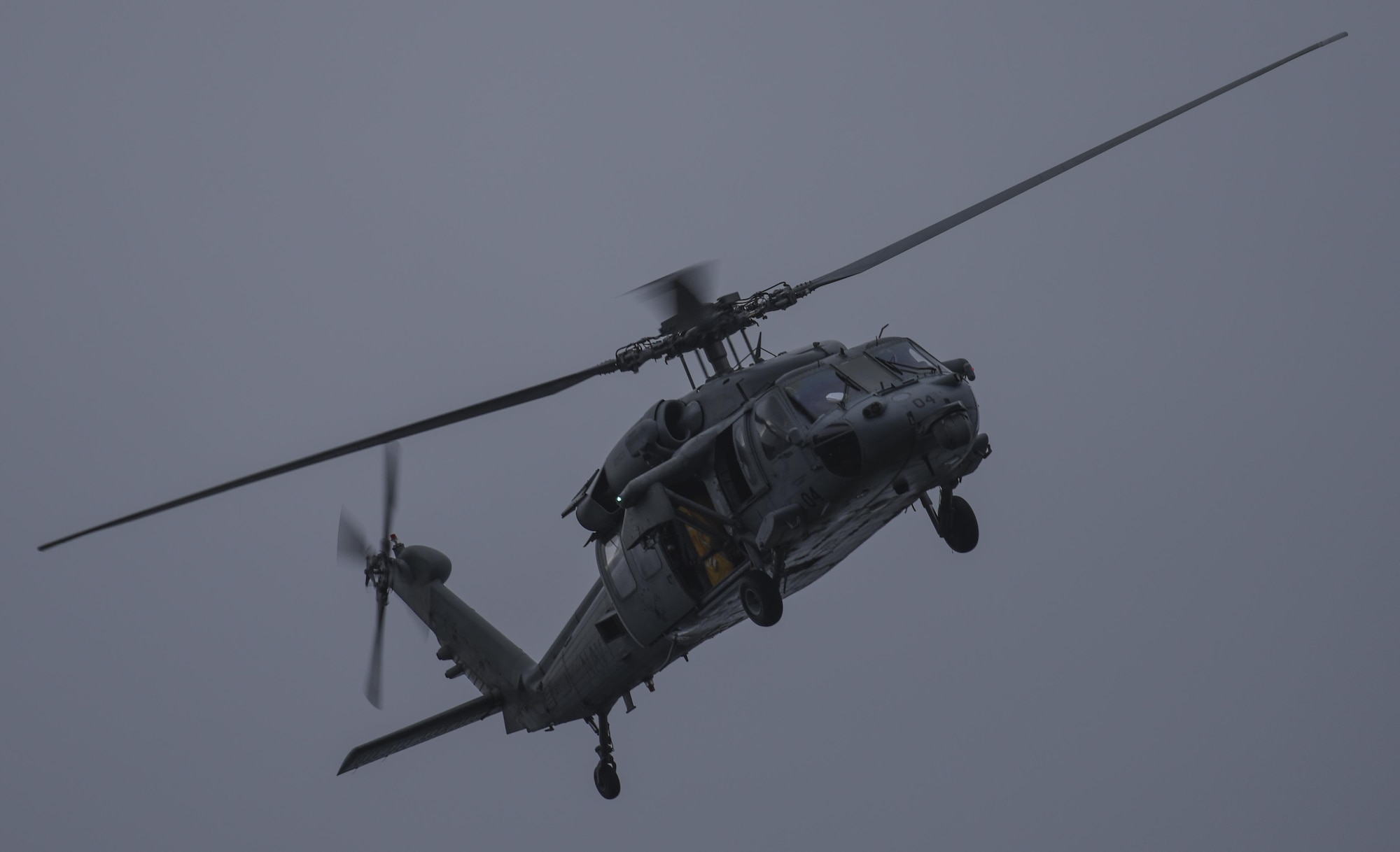 An MH-60S Sea Hawk helicopter assigned to the Island Knights of Helicopter Sea Combat Squadron (HSC) 25 conducts a training flight June 15, 2016, at Andersen Air Force Base, Guam. HSC-25 maintains a 24-hour search and rescue and medical evacuation alert posture, directly supporting the U.S. Coast Guard, Sector Guam and Joint Region Marianas. HSC-25 ensures maritime peace and security in the U.S. 7th Fleet area of responsibility. (U.S. Air Force photo by Tech. Sgt. Richard Ebensberger)