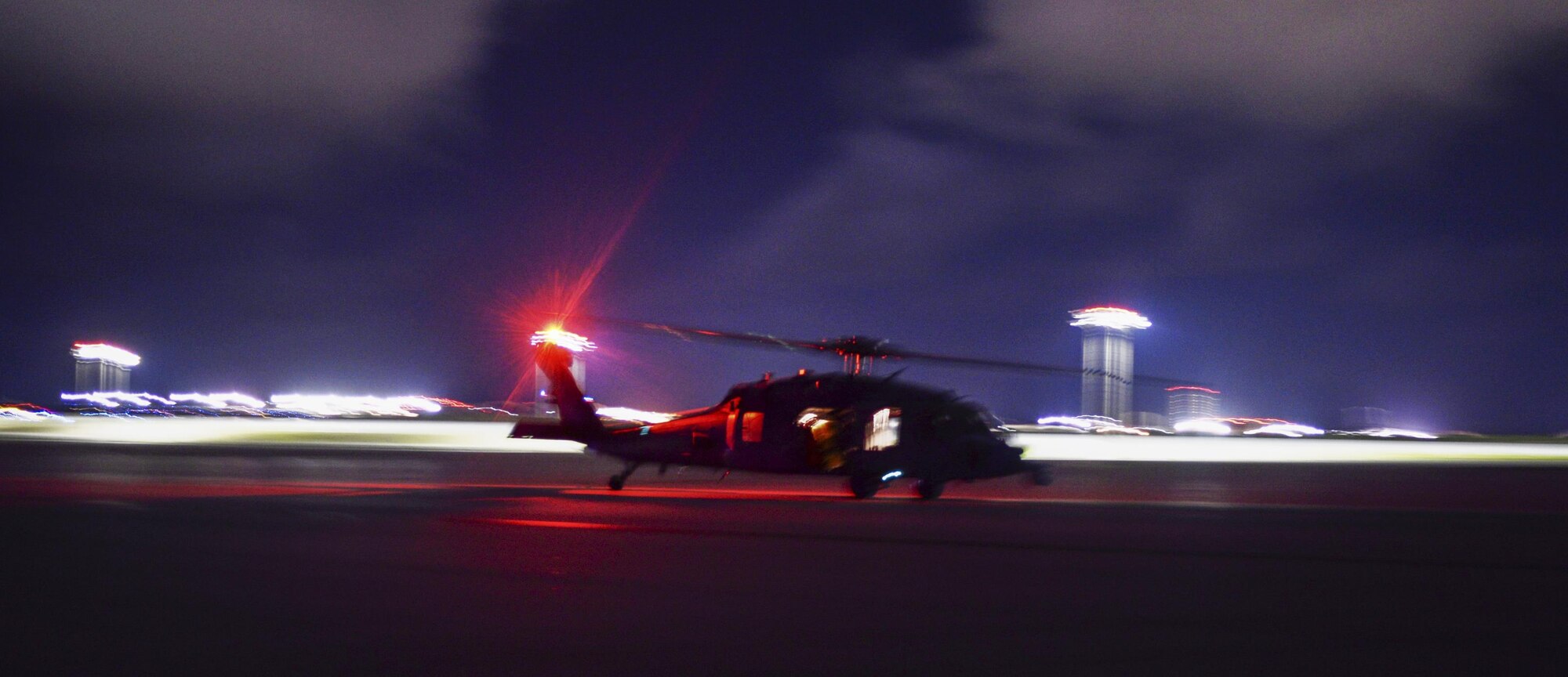 An MH-60S Sea Hawk helicopter assigned to the Island Knights of Helicopter Sea Combat Squadron (HSC) 25 condusts a training flight June 16, 2016, at Andersen Air Force Base, Guam. HSC-25 maintains a 24-hour search and rescue and medical evacuation alert posture, directly supporting the U.S. Coast Guard, Sector Guam and Joint Region Marianas. HSC-25 ensures maritime peace and security in the U.S. 7th Fleet area of responsibility. (U.S. Air Force photo by Tech. Sgt. Richard Ebensberger)