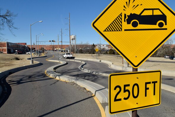 A warning sign indicating severe damage to vehicles is possible ahead if the vehicle entry denial barrier is activated on Jan. 24, 2017, Tinker Air Force Base, Oklahoma. Active and passive measures, such as the serpentine lanes also shown here, protect the base from unauthorized entry including gate-runners. (U.S. Air Force photo/Greg L. Davis)