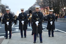 U.S. Marine Corps Staff Element stand at parade rest by Freedom Plaza along Pennsylvania Avenue, during the 58th Presidential Inauguration, Washington, D.C., Jan. 20, 2017. More than 5,000 military members from across all branches of the armed forces of the United States, including Reserve and National Guard components, provided ceremonial support and Defense Support of Civil Authorities during the inaugural period. (DoD photo by U.S. Army Sgt. Kalie Jones)