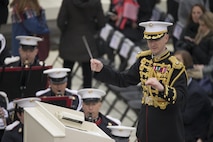 U.S. Marine Corps Lt. Col. Jason K. Fettig, band director with the Marine Corps Band, conducts during the 58th Presidential Inauguration at the U.S. Capitol Building, Washington, D.C., Jan 20, 2017. More than 5,000 military members from across all branches of the armed forces of the United States, including Reserve and National Guard components, provided ceremonial support and Defense Support of Civil Authorities during the inaugural period. (DoD photo by U.S. Marine Corps Lance Cpl. Cristian L. Ricardo)