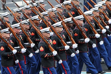 Marines of the U.S. Marine Corps Honor Guard march down Pennsylvania Avenue during the 58th Presidential Inauguration in Washington, D.C., Jan. 20, 2017. Military personnel assigned to Joint Task Force - National Capital Region provided military ceremonial support and Defense Support of Civil Authorities during the inaugural period. (DoD photos by U.S. Army Sgt. Paige Behringer)