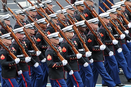 Marines of the U.S. Marine Corps Honor Guard march down Pennsylvania Avenue during the 58th Presidential Inauguration in Washington, D.C., Jan. 20, 2017. Military personnel assigned to Joint Task Force - National Capital Region provided military ceremonial support and Defense Support of Civil Authorities during the inaugural period. (DoD photos by U.S. Army Sgt. Paige Behringer)