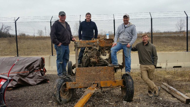 Technical Services Dive Team with recovered vehicle removed from Chicago Sanitary Ship Channel (left to right) Steve England, Weston Cross, Shanon Chader, John Winkelman (Not pictured: Dave Bala).
