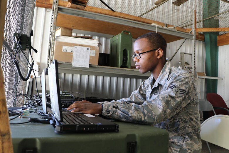 Senior Airman Wyatt Morgan 45th Aeromedical Evacuation Squadron communications technician establishes satellite communications during an exercise at MacDill AFB FL Feb. 2nd, 2017. During the four-day exercise, Airmen had the chance to work with members from other wings, multiple aircraft and practice being outside of their comfort zones. (U.S. Air Force Photo by Staff Sgt. Xavier Lockley)