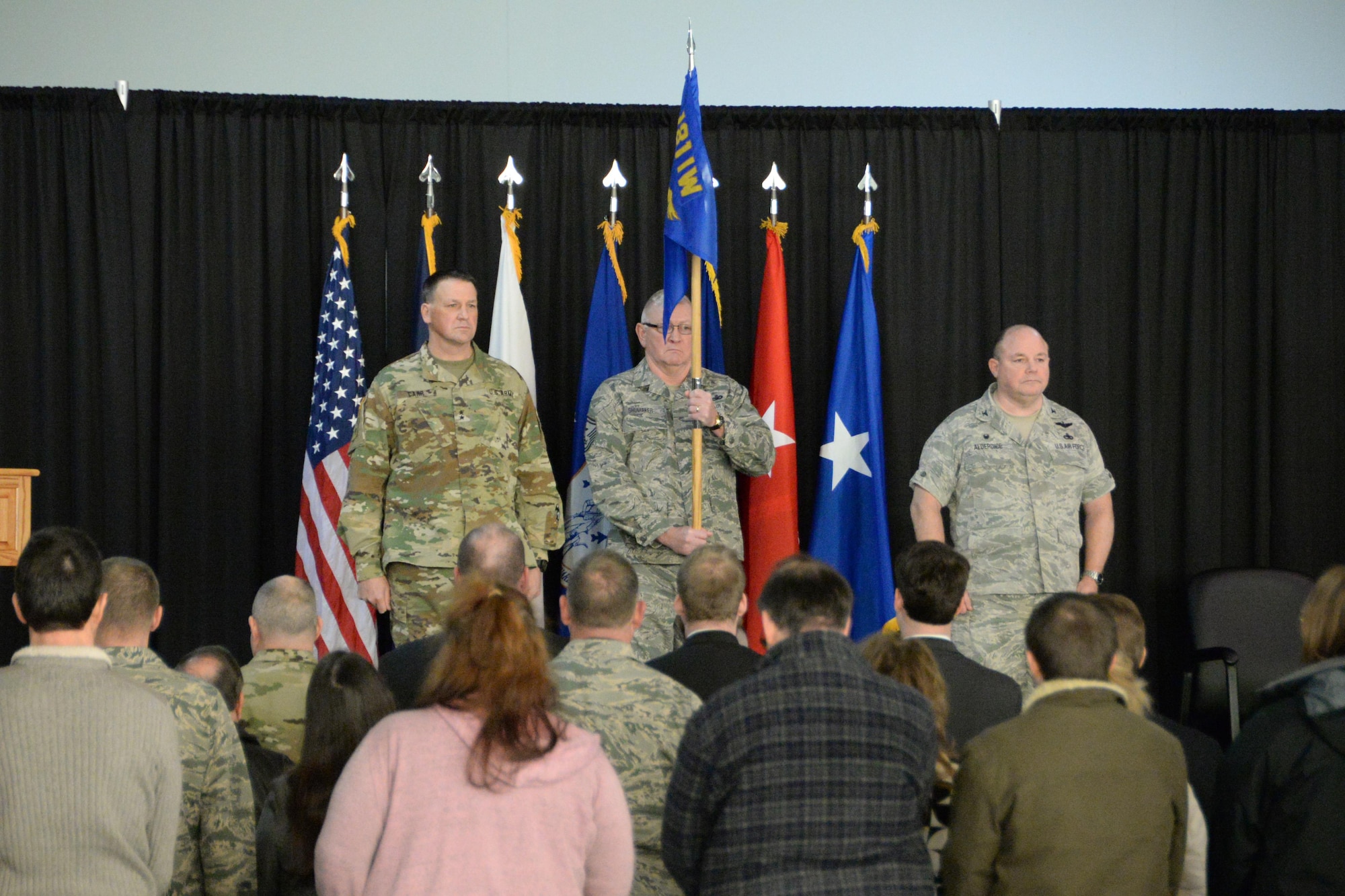 U.S. Air Force Col. Chris Alderdice, right, prepares to assume command of the 181st Intelligence Wing.   The Adjutant General of Indiana Maj. Gen. Courtney P. Carr, left, served as the presiding officer during the assumption of command ceremony, Feb. 4, 2017, at Hulman Field Air National Guard base, Terre Haute, Ind. (U.S. Air National Guard photo by Senior Airman Kevin D. Schulze)