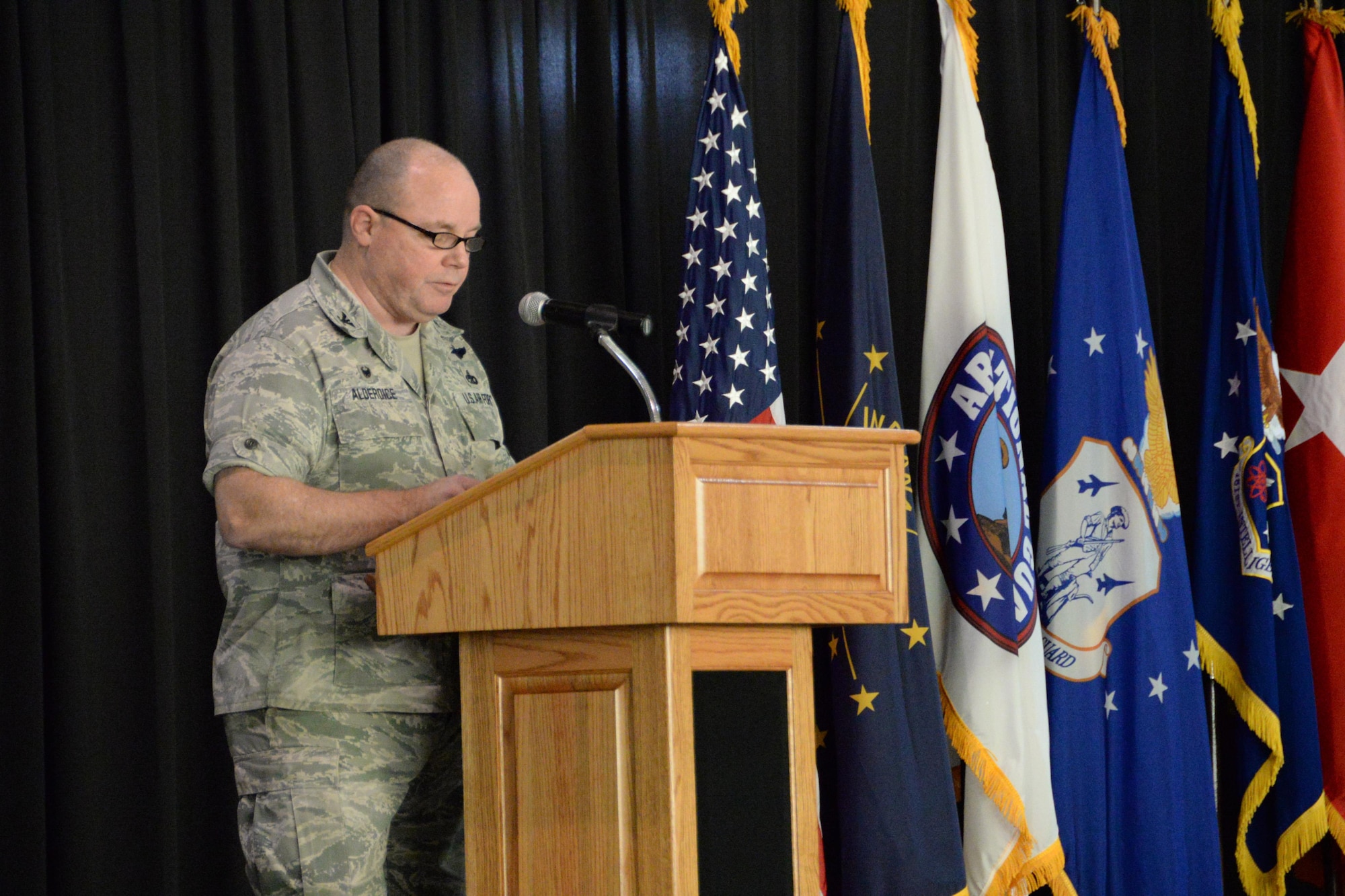 U.S. Air Force Col. Chris Alderdice, commander 181st Intelligence Wing, addresses Airmen following an assumption of command ceremony, Feb. 4, 2017, at Hulman Field Air National Guard base, Terre Haute, Ind. (U.S. Air National Guard photo by Senior Airman Kevin D. Schulze)