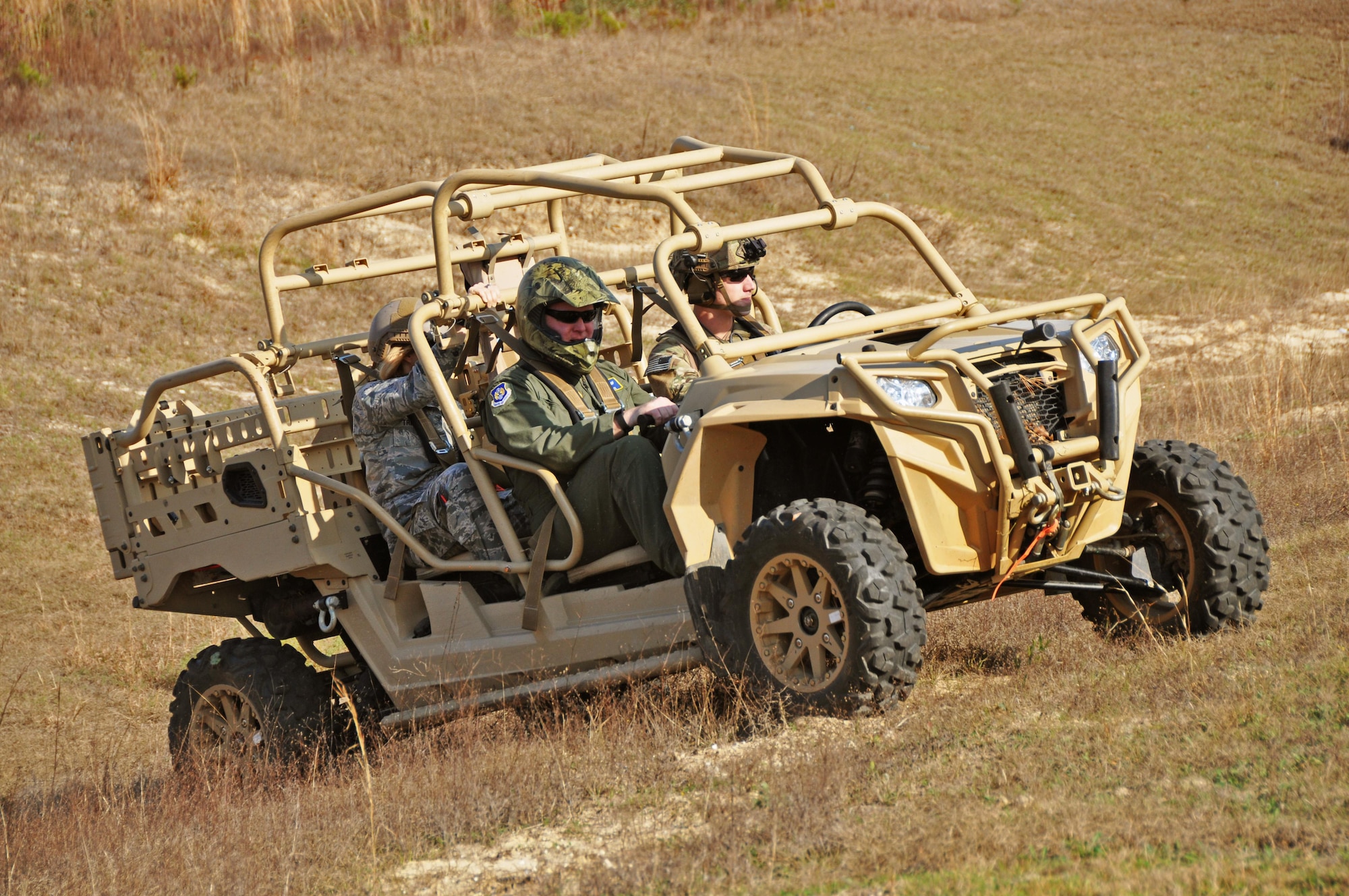 Maj. Gen. Richard Scobee, 10th Air Force commander, gets an orientation ride on a 919th Special Operations Security Forces Squadron all-terrain vehicle at Duke Field, Fla., Jan. 19, 2017. During his visits to Citizen Air Commandos at Duke and Hurlburt Field, Scobee held a wing-wide assembly and visited many of them at their work centers to observe and thank them for the work they do for the 919th Special Operations Wing’s diverse mission sets. (U.S. Air Force photo/Dan Neely)