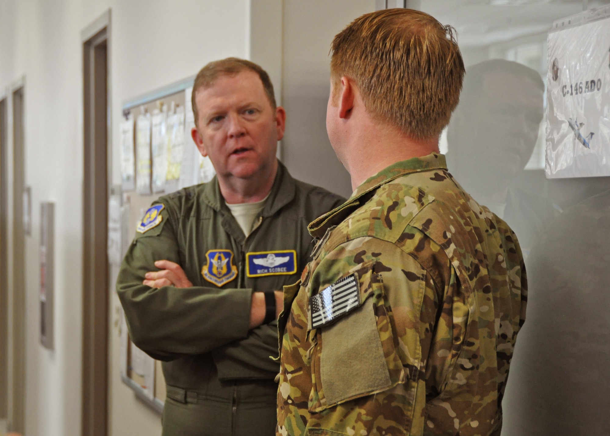 Maj. Gen. Richard Scobee, 10th Air Force commander, visits an operations work center at Duke Field, Fla., Jan. 19, 2017. During his visits to Citizen Air Commandos at Duke and Hurlburt Field, Scobee held a wing assembly and visited many of them at their work centers to observe and thank them for the work they do for the 919th Special Operations Wing’s diverse mission sets. (U.S. Air Force photo/Dan Neely)