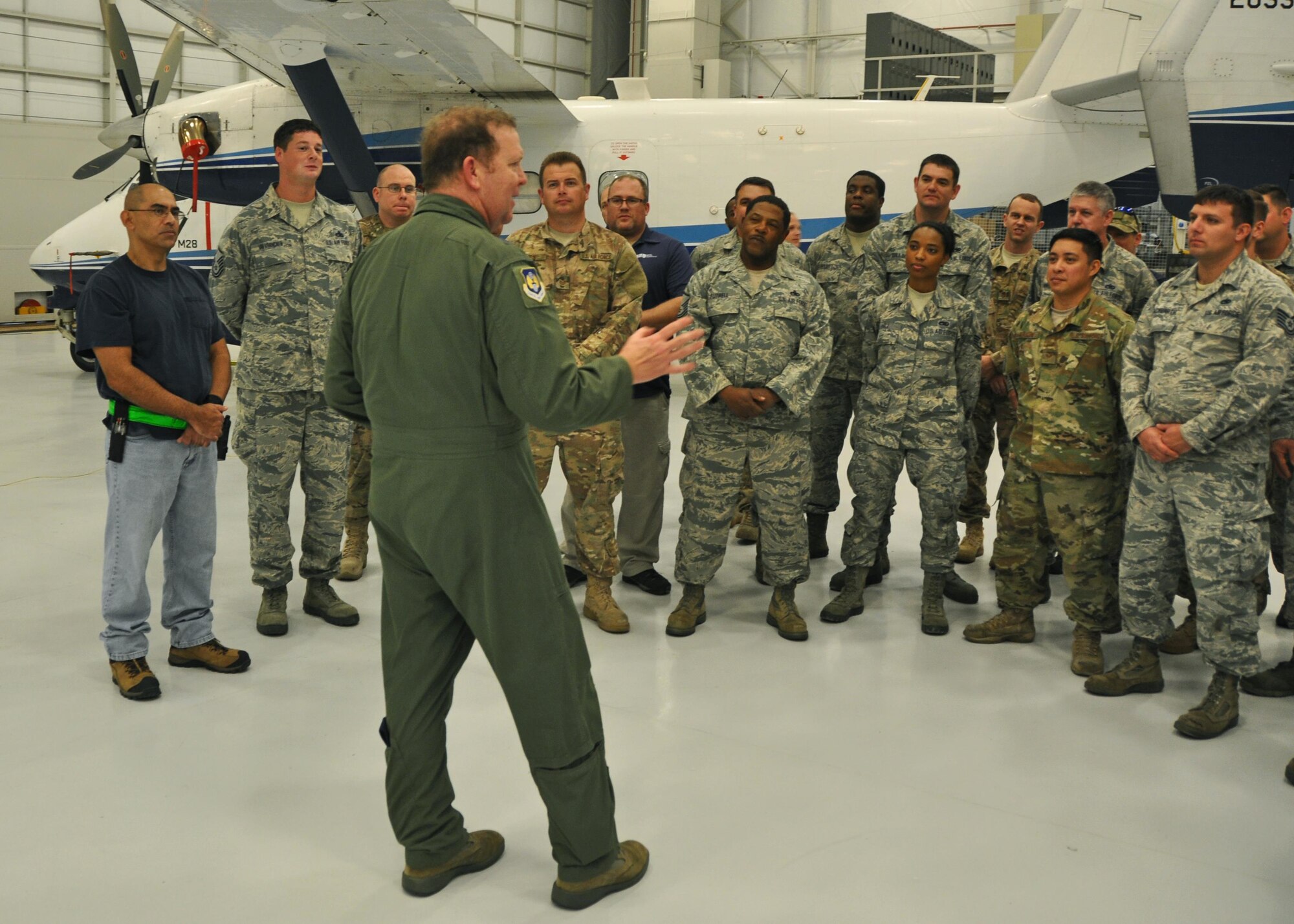 Maj. Gen. Richard Scobee, 10th Air Force commander, visits maintainers in a hangar at Duke Field, Fla., Jan. 19, 2017. During his visits to Citizen Air Commandos at Duke and Hurlburt Field, Scobee held a wing assembly and visited many of them at their work centers to observe and thank them for the work they do for the 919th Special Operations Wing’s diverse mission sets. (U.S. Air Force photo/Dan Neely)