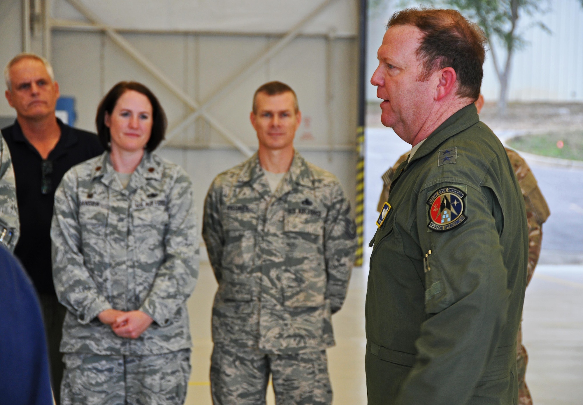 Maj. Gen. Richard Scobee, 10th Air Force commander, visits maintainers in a hangar at Duke Field, Fla., Jan. 19, 2017. During his visits to Citizen Air Commandos at Duke and Hurlburt Field, Scobee held a wing assembly and visited many of them at their work centers to observe and thank them for the work they do for the 919th Special Operations Wing’s diverse mission sets. (U.S. Air Force photo/Dan Neely)