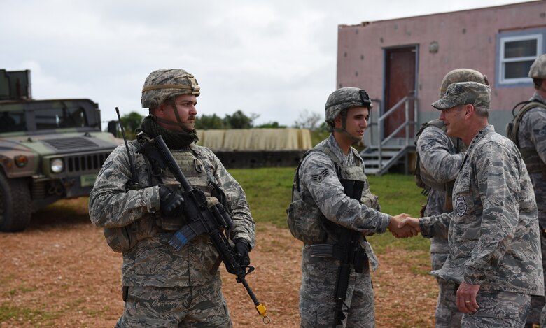 U.S. Air Force Airmen with the 736th Security Force Squadron, greet Gen. Terrence J. O’Shaughnessy, Pacific Air Forces commander, during a base visit Feb. 1, 2017, at Andersen Air Force Base, Guam. During his visit, O’Shaughnessy had the opportunity to tour the Pacific Regional Training Center and to see firsthand the capabilities of the 736th SFS Airmen and techniques they use to secure an airbase in an austere environment. (U.S. Air Force photo by Airman 1st Class Jacob Skovo)
