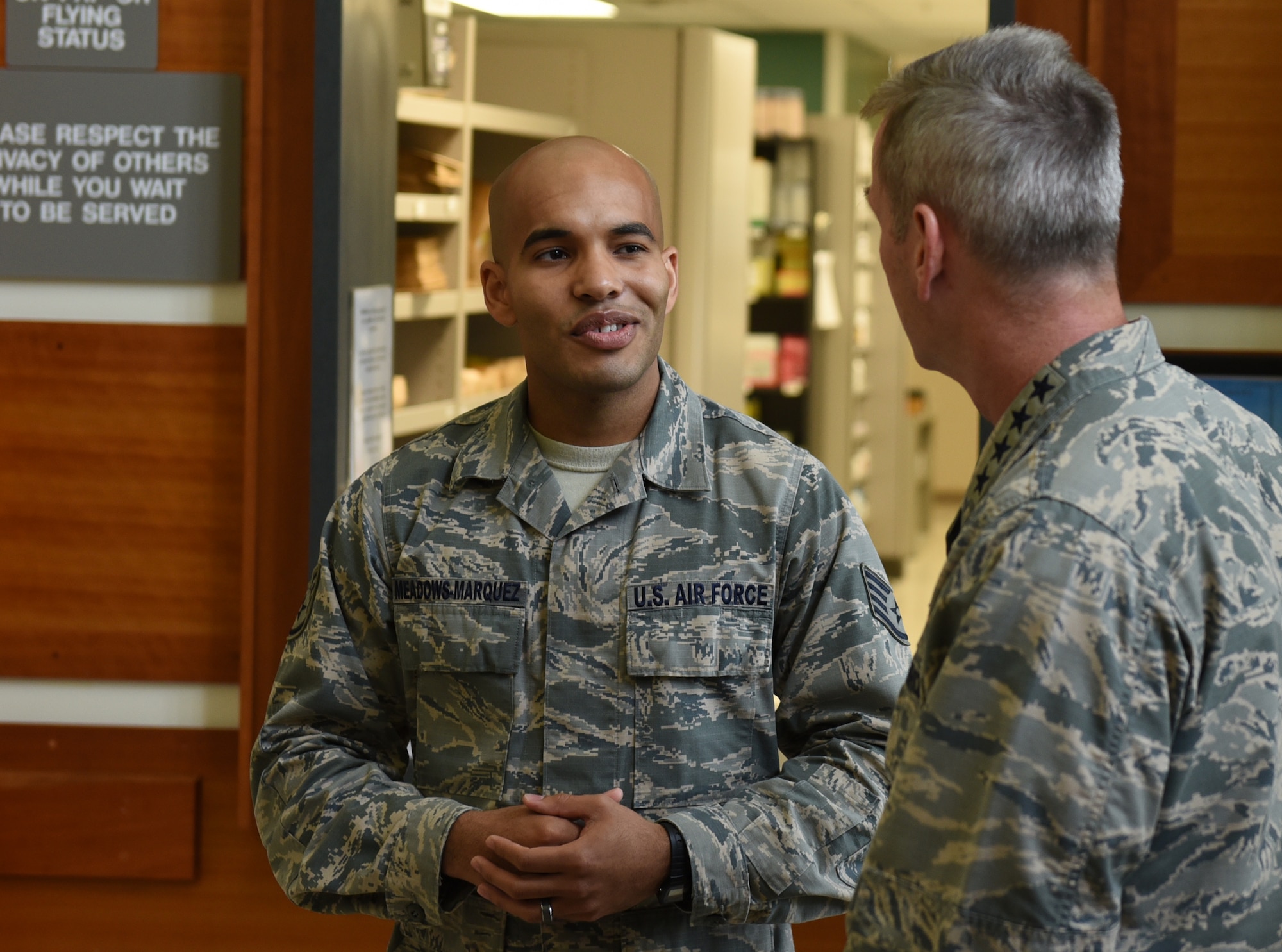 U.S. Air Force Staff Sgt. William Meadows-Marquez, left, pharmacy technician with the 36th Medical Group, briefs Gen. Terrence J. O'Shaughnessy, Pacific Air Forces commander, on the pharmacy’s support to the wing Feb. 1, 2017, at Andersen Air Force Base, Guam. During his visit, O'Shaughnessy visited with Airmen and Soldiers from across the base to gain a firsthand understanding of their mission, capabilities and the base resources available to them. He also discussed the strategic importance of Guam in the Indo-Asia-Pacific region and thanked Airmen for their continued dedication and support. (U.S. Air Force photo by Airman 1st Class Jacob Skovo)
