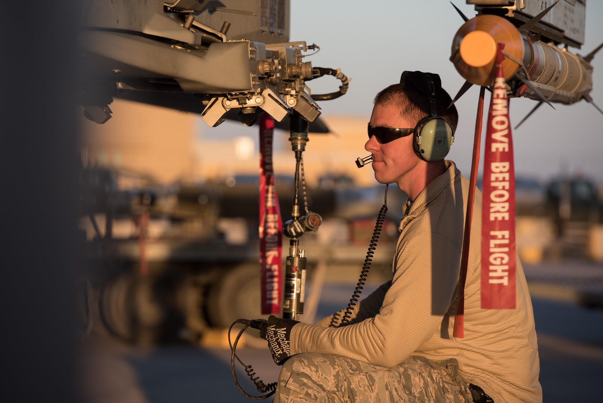 Tech. Sgt. Joseph Benoit, 407th Expeditionary Maintenance Squadron weapons specialist, tests the functionality of weapons rack releasing system of an F-16 Fighting Falcon at the 407th Air Expeditionary Group Feb. 4, 2017. The 407th Air Expeditionary Group is supporting Operation Inherent Resolve in the fight against the Islamic State of Iraq and the Levant.  (U.S. Air Force photo/Master Sgt. Benjamin Wilson)(Released)