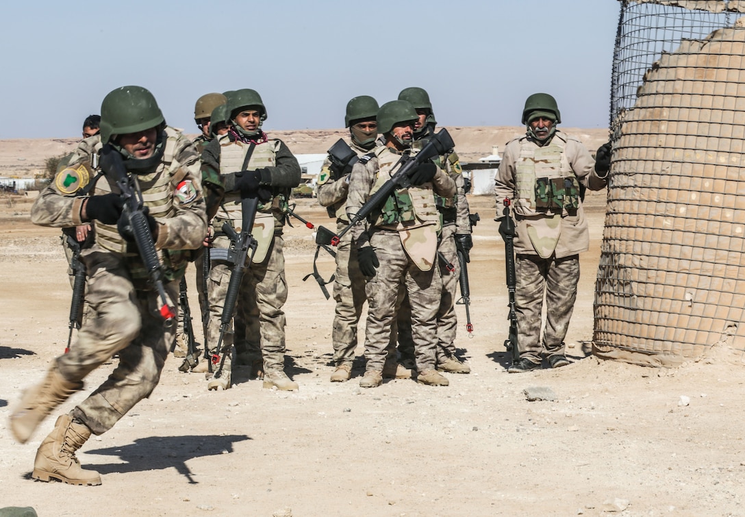 Iraqi security forces soldiers conduct react to contact training at Al Asad Air Base, Iraq, Feb. 1, 2017. Training at building partner capacity sites is an integral part of Combined Joint Task Force – Operation Inherent Resolve’s effort to train ISF personnel.  CJTF-OIR is the global Coalition to defeat ISIL in Iraq and Syria.  (U.S. Army photo by Sgt. Lisa Soy)