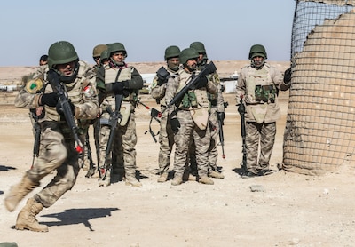 Iraqi security forces soldiers conduct react to contact training at Al Asad Air Base, Iraq, Feb. 1, 2017. Training at building partner capacity sites is an integral part of Combined Joint Task Force – Operation Inherent Resolve’s effort to train ISF personnel.  CJTF-OIR is the global Coalition to defeat ISIL in Iraq and Syria.  (U.S. Army photo by Sgt. Lisa Soy)