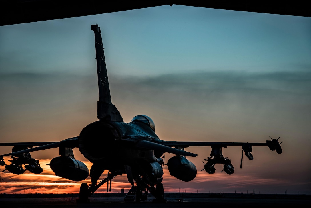An F-16 Fighting Falcons sits on the flightline at sunset at the 407th Air Expeditionary Group Feb. 4, 2017. The F-16 is part of the 134th Expeditionary Fighter Squadron, supporting Operation Inherent Resolve in the fight against the Islamic State of Iraq and the Levant. (U.S. Air Force photo/Master Sgt. Benjamin Wilson)(Released)