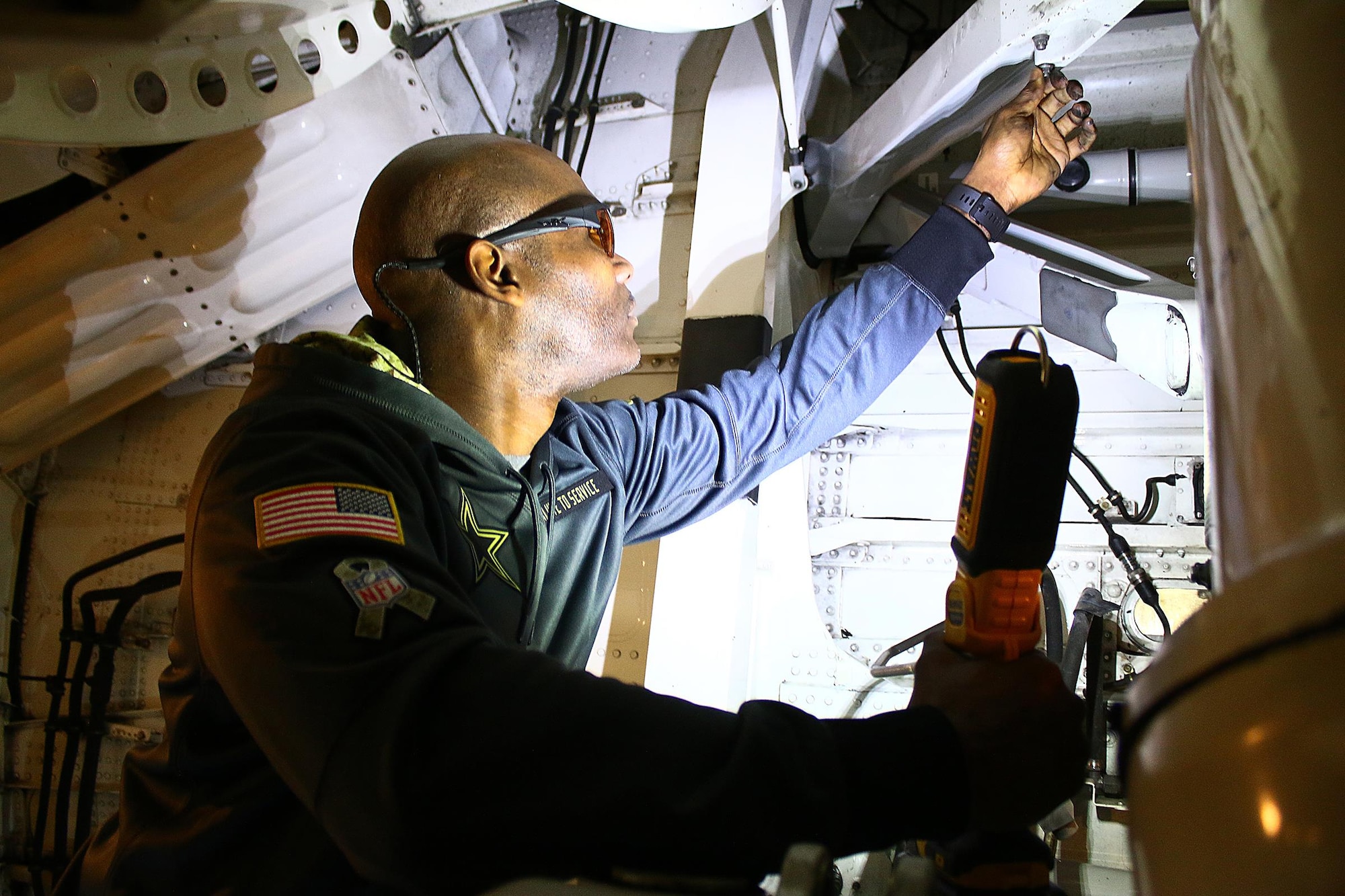 Tech. Sgt. Toron Franklin, 445th Maintenance Squadron, aerospace repair journeyman, performs a routine landing gear inspection on a C-17 Globemaster III here Jan. 23, 2017. (U.S. Air Force photo /Tech. Sgt. Patrick O’Reilly)