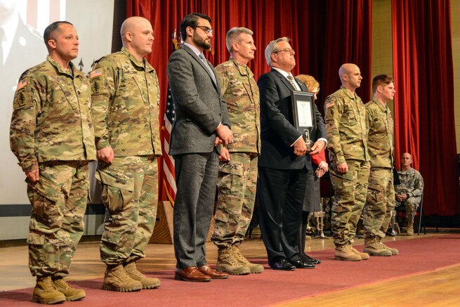 U.S. Army Special Forces Soldiers Lt. Col. Kevin Trujillo, Commander of the 2nd Battalion, 10th Special Forces Group (Airborne) (Left), Col. Isaac Peltier, Commander of the 10th SFG(A), Gen. John Nicholson, Commander of the Resolute Support mission of U.S. Forces-Afghanistan, stand with David and Rosemarie Byers, parents of Maj. Andrew Byers, Sgt. 1st Class Brian Seidl, and Staff Sgt. Andrew Russell after presenting them with their Silver Star Medals at Fort Carson, Colo., Feb. 1, 2017. Seidl and Russell were awarded, and Maj. Byers was posthumously awarded, the Silver Star for their actions in combat during the Battle of Boz Qandahari, Afghanistan on Nov. 2-3, 2016.  (U.S. Army photo by Pfc. Christopher Stevenson)
