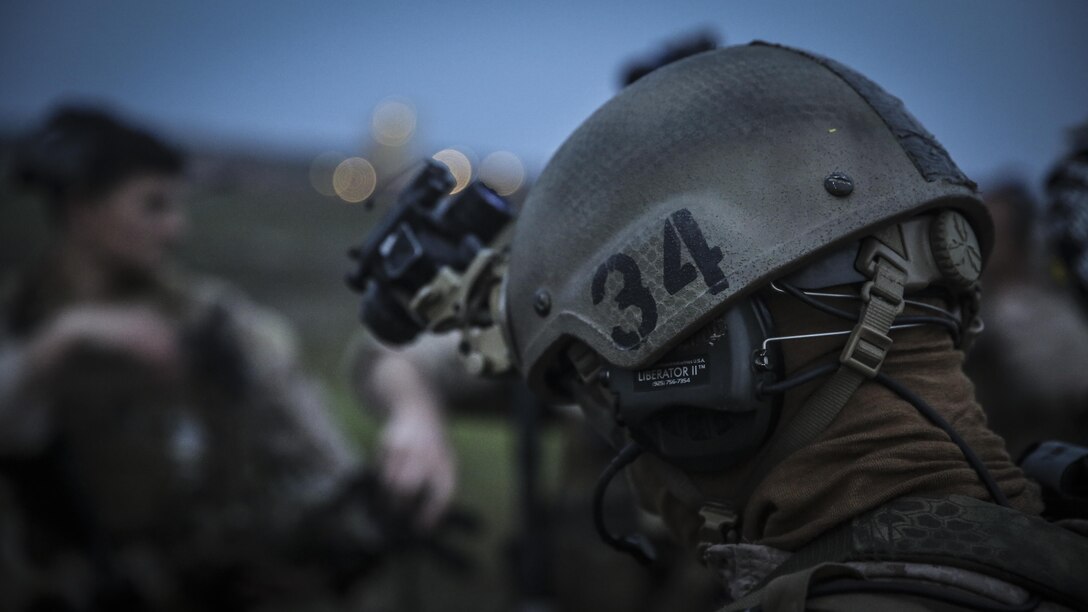 A Marine with the 15th Marine Expeditionary Unit Maritime Raid Force stands by for transportation to the location of a simulated raid at Camp Pendleton, Feb. 1, 2017. This exercise affords the opportunity for Marines from supporting units to begin training side by side with the MRF in preparation for deployment. The pre-deployment training the 15th MEU is conducting ensures the Marines and Sailors are prepared to answer the Nation’s call should the need arise.