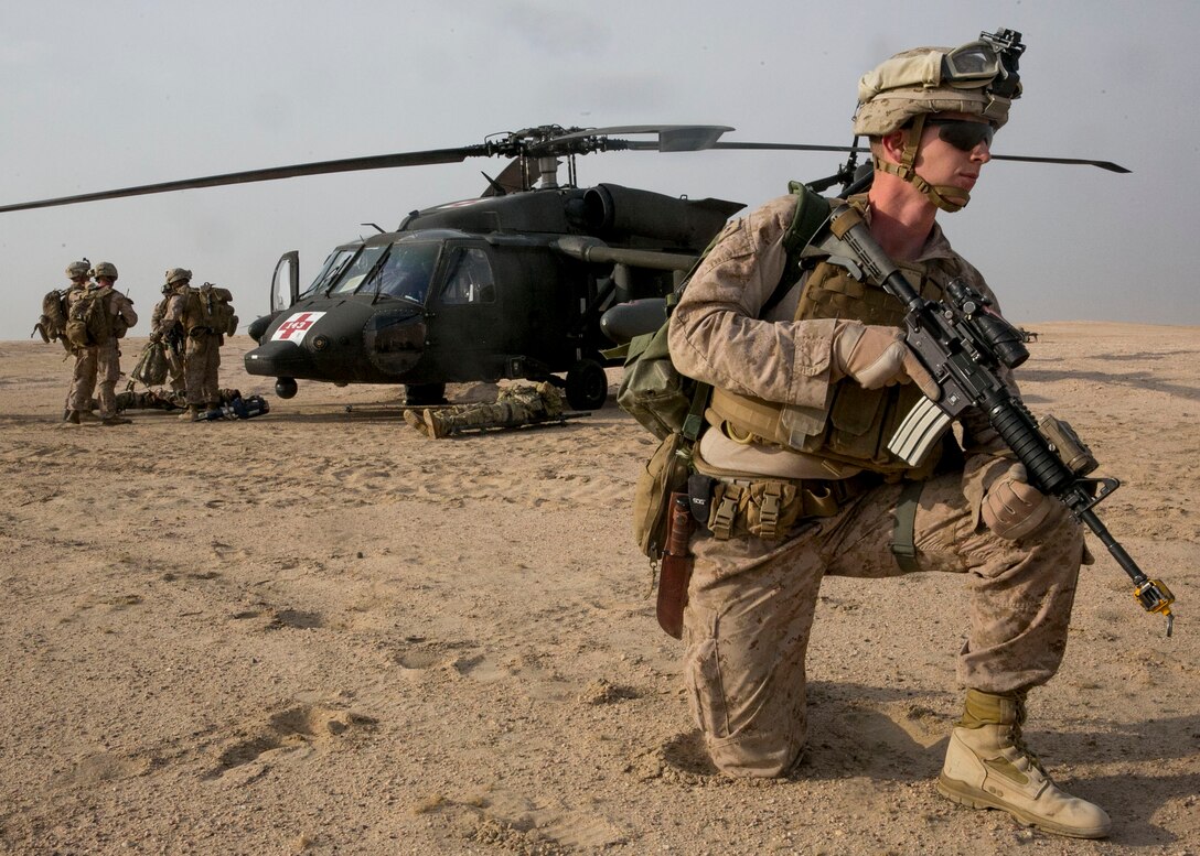 U.S. Marine Cpl. Jesse Moore, a radio operator with India Company, 3rd Battalion, 7th Marine Regiment, Special Purpose Marine Air-Ground Task Force-Crisis Response-Central Command, provides security around an HH-60M Black Hawk helicopter for the extraction of simulated isolated personnel during a tactical recovery of aircraft and personnel exercise while forward deployed in the Middle East, Jan. 26, 2017. SPMAGTF Marines consistently train to enhance their ability to react to any mission they may encounter while conducting USCENTCOM’s crisis response mission. 