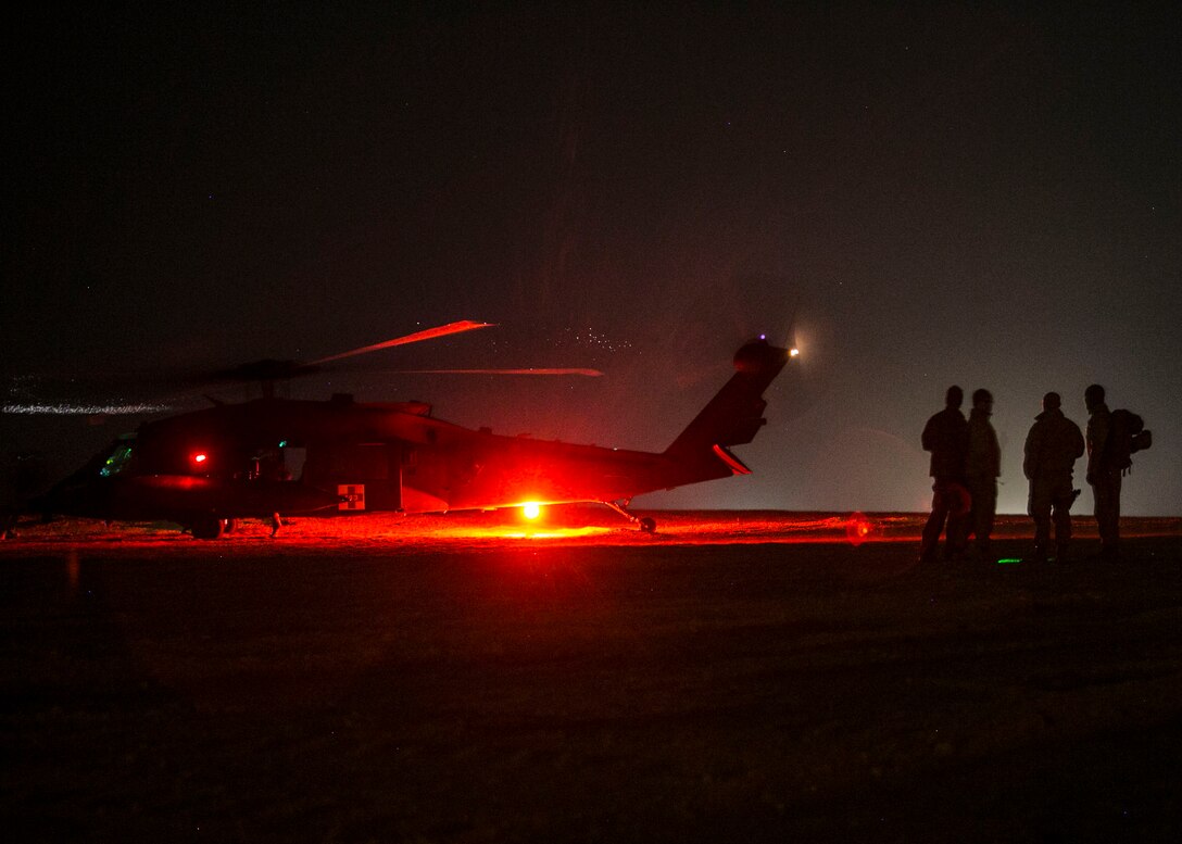 U.S. Marines with Special Purpose Marine Air-Ground Task Force-Crisis Response-Central Command standby an HH-60M Black Hawk helicopter to evaluate Marines during a tactical recovery of aircraft and personnel exercise while forward deployed in the Middle East, Jan. 26, 2017. The SPMAGTF is a self-sustaining expeditionary unit, designed to provide a broad range of crisis response capabilities throughout the Central Command area of responsibility, using organic aviation, logistical, and ground combat assets. 