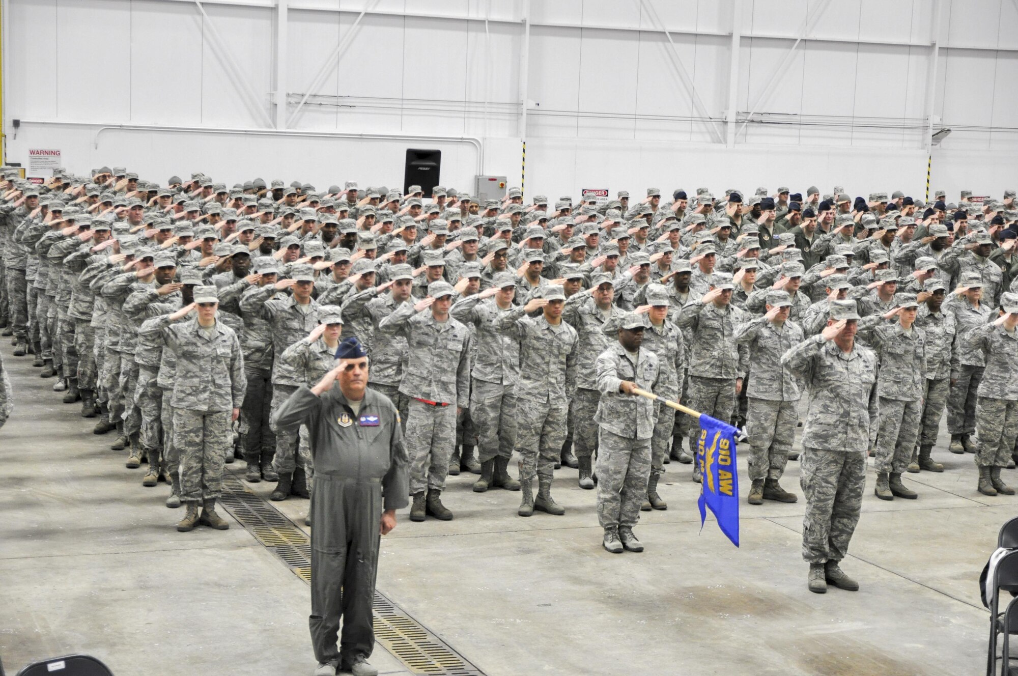Airmen from the 910th Airlift Wing stand in formation and salute during an assumption of command ceremony here Feb. 4, 2017. During the ceremony, Col. Daniel Sarachene assumed command of the 910th Airlift Wing and Youngstown Air Reserve Station. Sarachene is the first Mahoning County resident to assume command of the 910th since at least 1981. He spent the majority of his career at YARS before becoming the vice commander of Niagara Falls Air Reserve Station, New York in 2014. (U.S. Air Force photo/Senior Airman Joshua Kincaid)