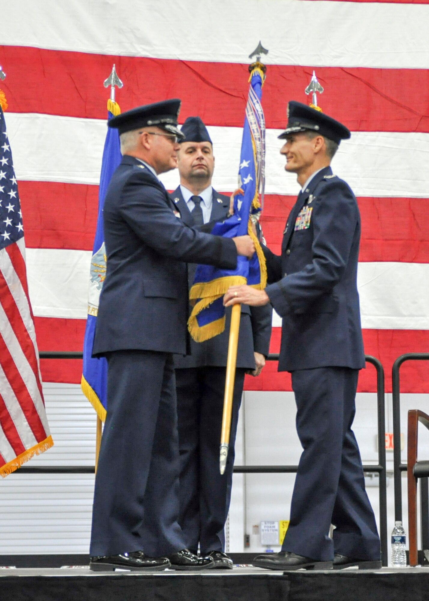 Col. Daniel Sarachene accepts the 910th Airlift Wing unit flag from Maj. Gen. John P. Stokes, commander of 22nd Air Force, Dobbins Air Reserve Base, Georgia, during an assumption of command ceremony here, Feb. 4, 2017. Sarachene is the first Mahoning County resident to assume command of the 910th since at least 1981. He spent the majority of his career at YARS before becoming the vice commander of Niagara Falls Air Reserve Station, New York in 2014. (U.S. Air Force photo/Senior Airman Joshua Kincaid)