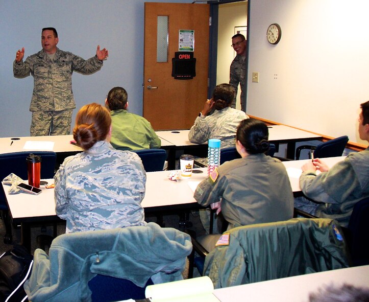 932nd Maintenance Group member Chief Master Sgt. Shane Wagner, teaches about proper bullet writing and the need to sit on selection boards, during a professional development series of classes held on February 5, 2017, at Scott Air Force Base.  Here he shares a point of emphasis on writing clearly with the 932nd Airlift Wing Airmen in attendance.  (U.S. Air Force photo by Lt. Col. Stan Paregien)