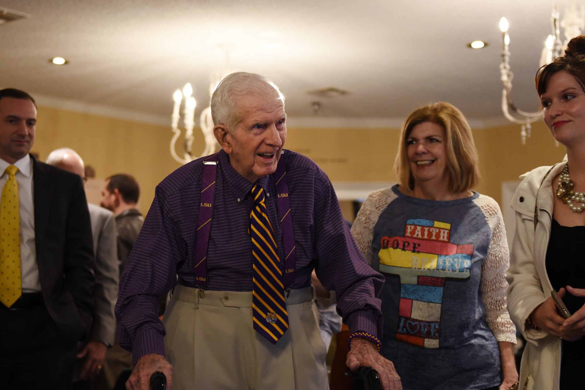 Raymond Odom, 93-year-old World War II veteran, greets friends and family during an event held at Arbor Rose Assisted Living Facility in Farmerville, La., Feb. 2, 2017. Odom served in the 8th Air Force during WWII and lost sight of his dog tags before heading back to the U.S. after the war was over. In May 2016, his dog tags were discovered in England, and sent to Louisiana where they were presented to him by the 8th Air Force commander, U.S. Air Force Maj. Gen. Thomas Bussiere. (U.S. Air Force photo by Senior Airman Erin Trower)