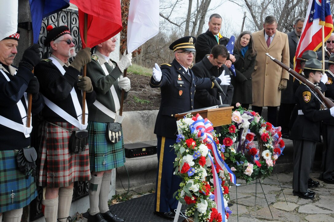 Chaplain (Maj.) Scott Hagen, deputy command chaplain, 88th Regional Support Command, leads the closing prayer following the wreath-laying ceremony honoring President William Henry Harrison, in North Bend, Ohio, Feb. 3, 2017.