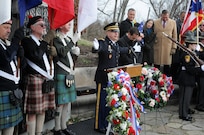 Chaplain (Maj.) Scott Hagen, deputy command chaplain, 88th Regional Support Command, leads the closing prayer following the wreath-laying ceremony honoring President William Henry Harrison, in North Bend, Ohio, Feb. 3, 2017.
