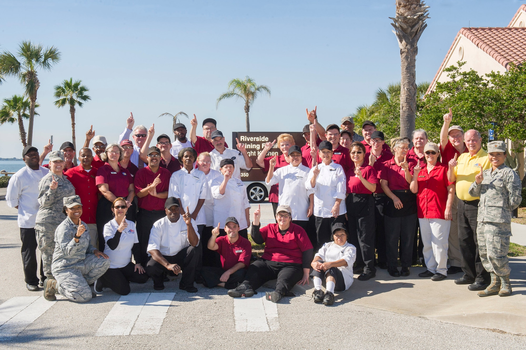 The Riverside Dining Facility staff stands in front of the dining facility at Patrick Air Force Base, Fla., Feb. 1, 2017. The Best Never Rest is the 45th Force Support Squadron's motto, and the team is eager to showcase the RDF during the Air Force Hennessy evaluation, which begins this month. 