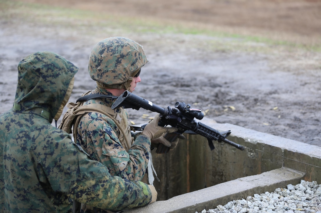 Pfc. Louis Hobbs with Transportation Support Company, Combat Logistics Battalion 2, loads his rifle during a live fire exercise at Camp Lejeune, N.C., Feb. 3, 2017. The Marines conducted the training in order to familiarize themselves with their newly issued rifles in preparation for annual rifle qualifications. The Marines were able to get their Battle Sight Zero (BZO) to provide accurate and effective training as they continue on to other ranges in the coming months. (Marine Corps photo by Cpl. Shannon Kroening)