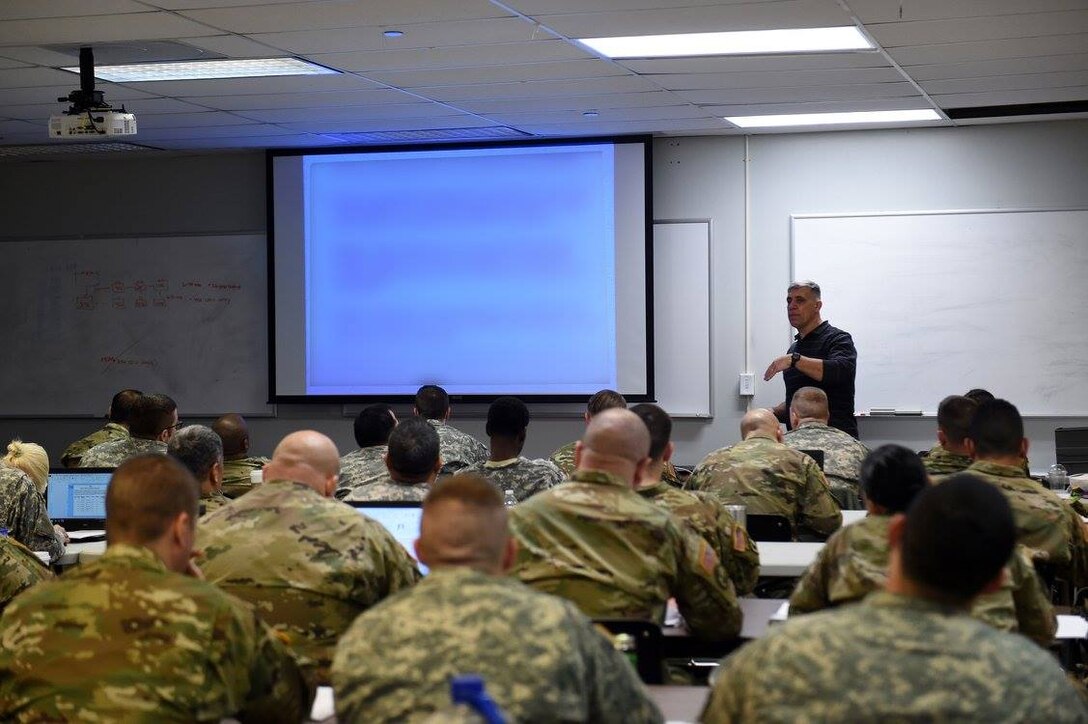 Mitch Darknell, U.S. Army Reserve Command Physical Security Inspector, discusses USARC requirements for storing and the security of arms, ammo and explosives (AA&E) to Army Reserve and active component physical security officers during a two-day USARC Physical Security workshop hosted at the 85th Support Command headquarters, Jan. 31-Feb. 1, 2017. The training workshop certified battalion-level and higher physical security officers and reviewed all requirements to establish a successful PS program. Near 70 Soldiers assigned to 416th Theater Engineer Command, 353rd Civil Affairs Command, 200th Military Police Command, 95th Division, 103rd Sustainment Command (Expeditionary), 75th Training Division, 85th Support Command, 88th Regional Support Command, and all of First Army’s active component brigades were in attendance. 
(U.S Army photo by Mr. Anthony L. Taylor/Released)