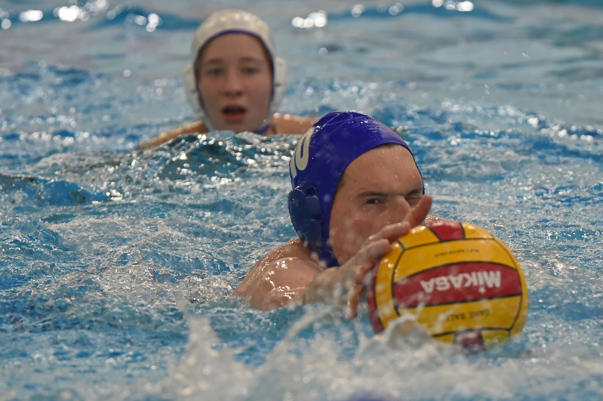 Service members participate in a water polo practice session at the Buckner Physical Fitness Center pool at Joint Base Elmendorf-Richardson, Alaska, Feb. 1, 2017. The inner tube water polo intramural season will continue through to April, with games each Wednesday. 