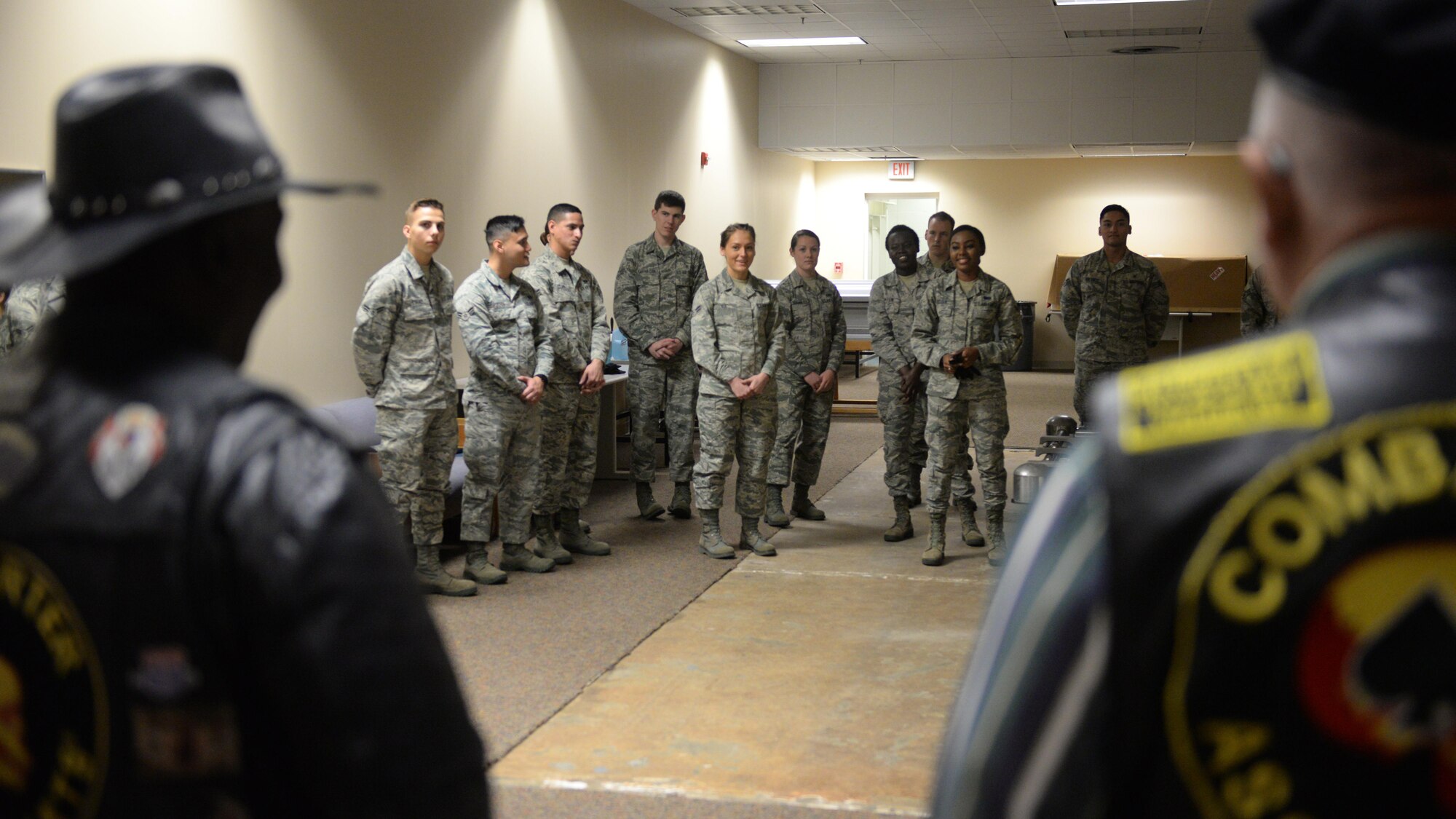 Keesler Air Force Base Honor Guardsmen introduce themselves to members of the Combat Veteran Motorcycle Association during a shadow box presentation ceremony at the Locker House Jan. 26, 2017 on Keesler AFB, Miss. During the ceremony, the CVMA presented a shadow box to the Keesler AFB Honor Guard for their roll in five Congressional Medal of Honor ceremonies and numerous funerals held at the Biloxi National Cemetery during the last six years. (U.S. Air Force photo by Airman 1st Class Travis Beihl)