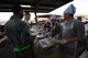 Volunteers from the 56th Fighter Wing Chaplain office serve free meals to Airmen and their families during the monthly flight line feast, Feb. 2, 2017 at Luke Air Force Base, Ariz. The flight line feast is one of many community outreach events the chaplain’s office holds to get Airmen more involved and comfortable with the chaplains and the services they offer. (U.S. Air Force photo by Airman 1st Class Caleb Worpel)