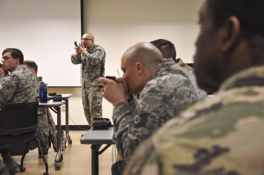 Master Sgt. Orlando Salas Jr., 421st Combat Training Squadron instructor, teaches proper use of the lensatic compass during land navigation training at the United States Air Force Expeditionary Operation School on Joint Base McGuire-Dix-Lakehurst, New Jersey, Jan. 30. Salas's course is one of the key components of the USAF EOS's pre-deployment training, which prepares general forces Airmen to survive and operate in expeditionary environments. (U.S. Air Force photo by Capt. Matthew Chism)