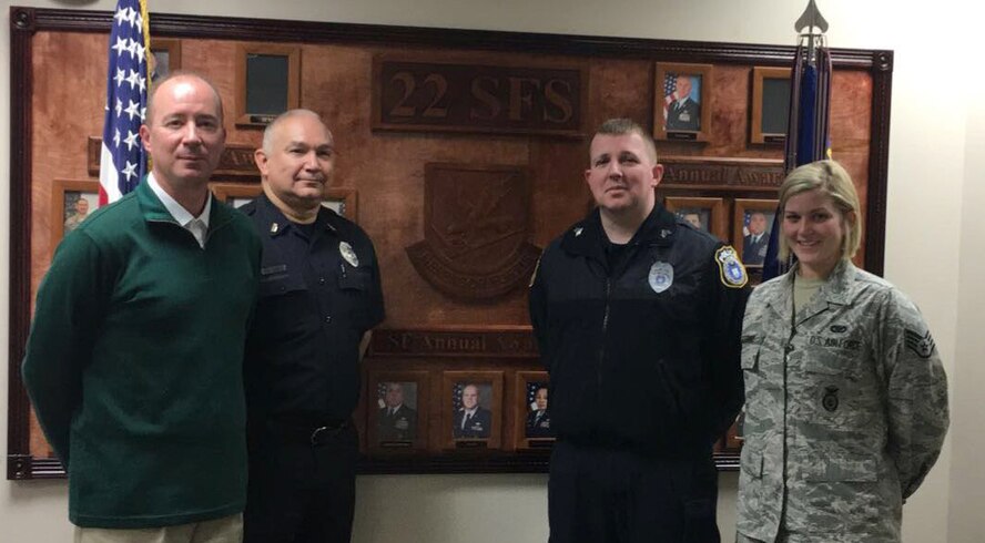 Ken Chrapkowski, left, 22nd Security Forces Squadron deputy security officer and 2016 Outstanding Security Forces Support Staff Civilian of the Year award winner, poses for a photo with the squadron’s previous Air Force level award winners Feb. 6, 2017, at McConnell Air Force Base, Kan. The unit has had Air Force level award winners for five consecutive years. (Courtesy photo)