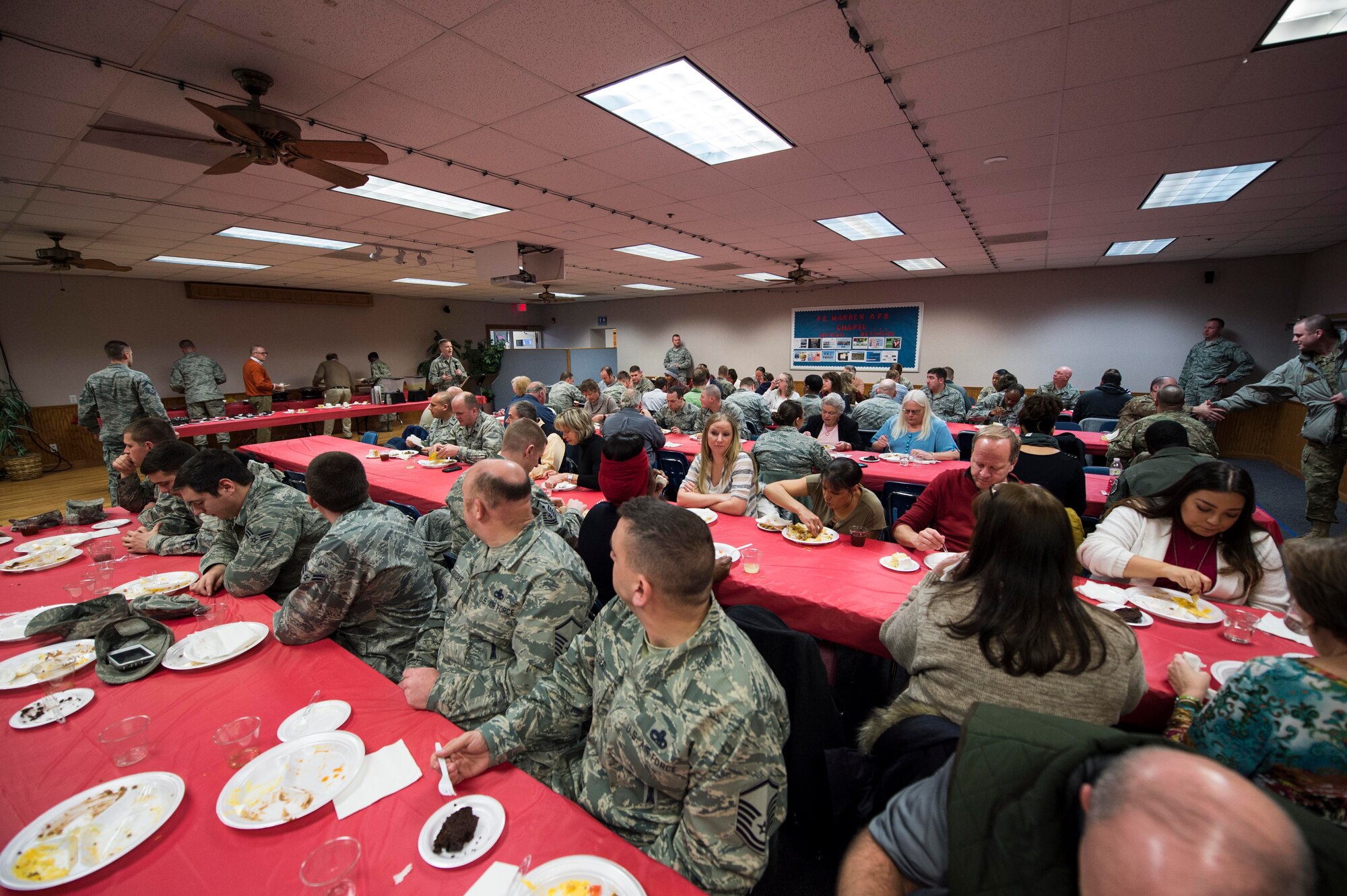 Members of the base community participate in the fellowship luncheon in the Chapel Activity Center at F.E. Warren Air Force Base, Wyo., Feb. 2, 2017. Members with base access are invited to attend the luncheons which are held on the first Wednesday of each month at the Chapel Activity Center. (U.S. Air Force photo by Staff Sgt. Christopher Ruano)