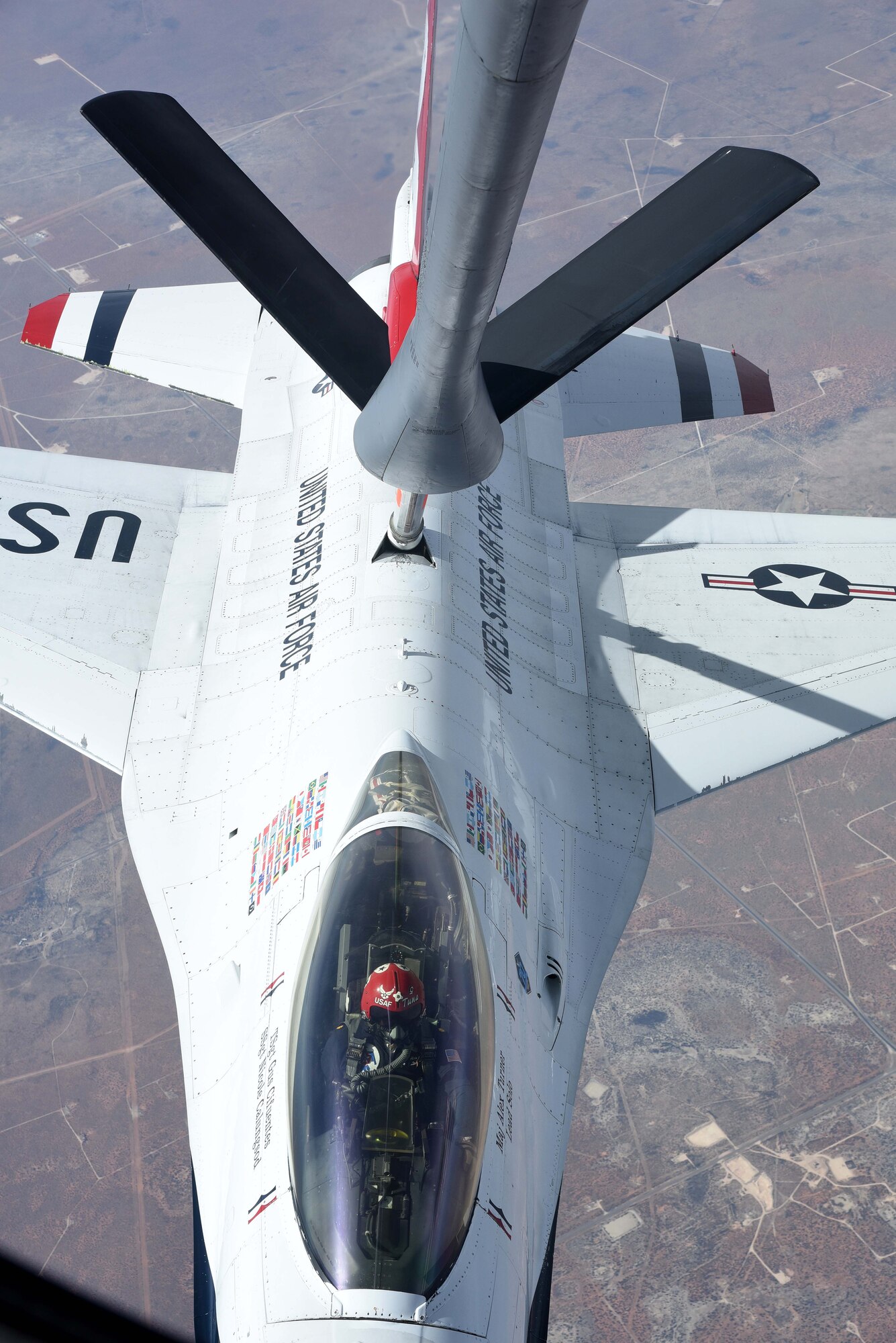 An F-16 Fighting Falcon assigned to Nellis Air Force Base, Nev., is refueled by A KC-135 Stratotanker assigned to McConnell AFB, Kan., Feb. 3, 2017, en route to Houston, Texas. The KC-135 Stratotanker provides the core aerial refueling capability for the United States Air Force and has excelled in this role for 60 years. (U.S. Air Force photo/Airman 1st Class Erin McClellan)