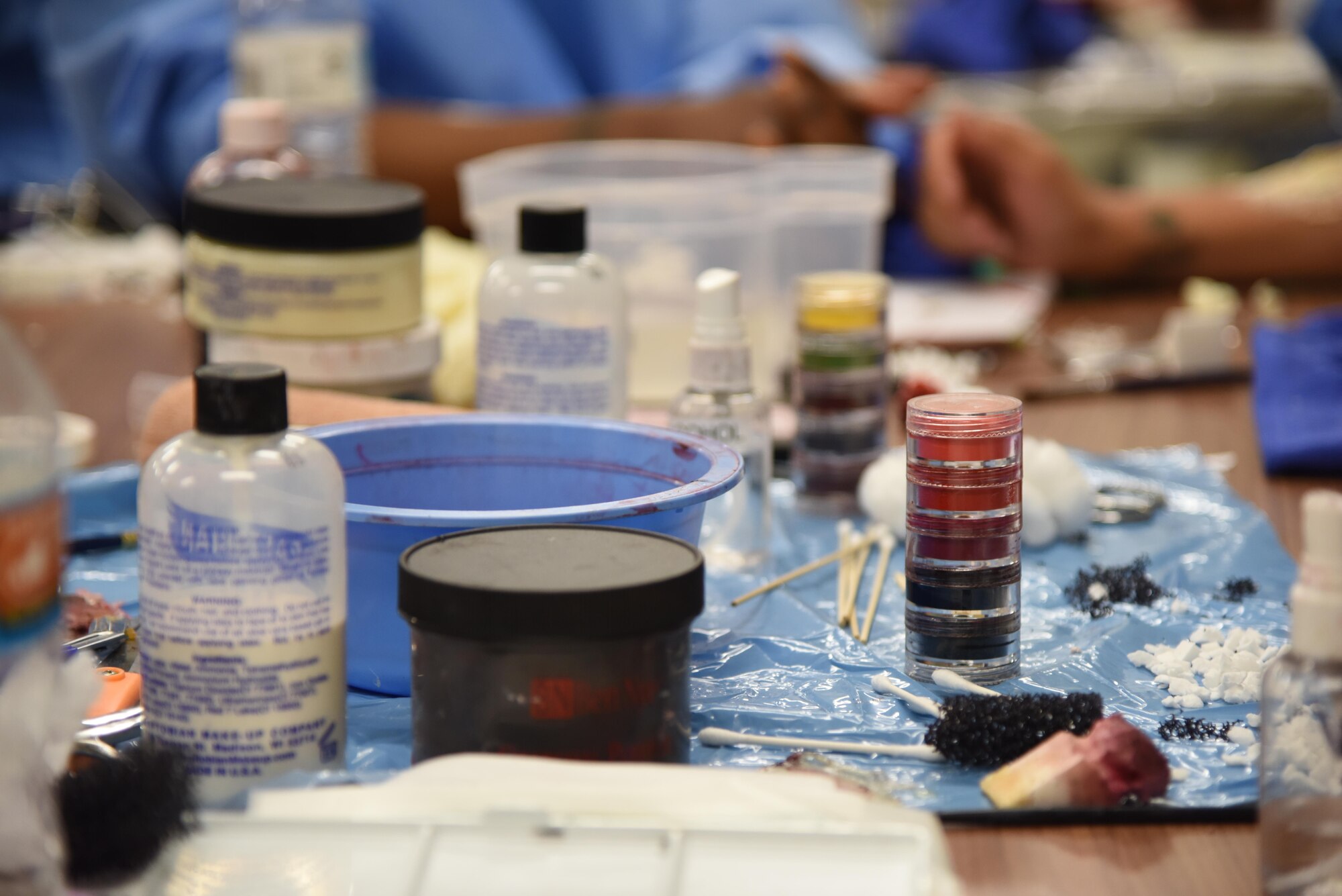 Moulage materials sit on a table during a training session at Allee Hall Jan. 18, 2017, on Keesler Air Force Base, Miss. The session was held to teach volunteers how to apply moulage on exercise “casualties” to provide emergency responders with a more realistic training experience. (U.S. Air Force photo by Kemberly Groue)
