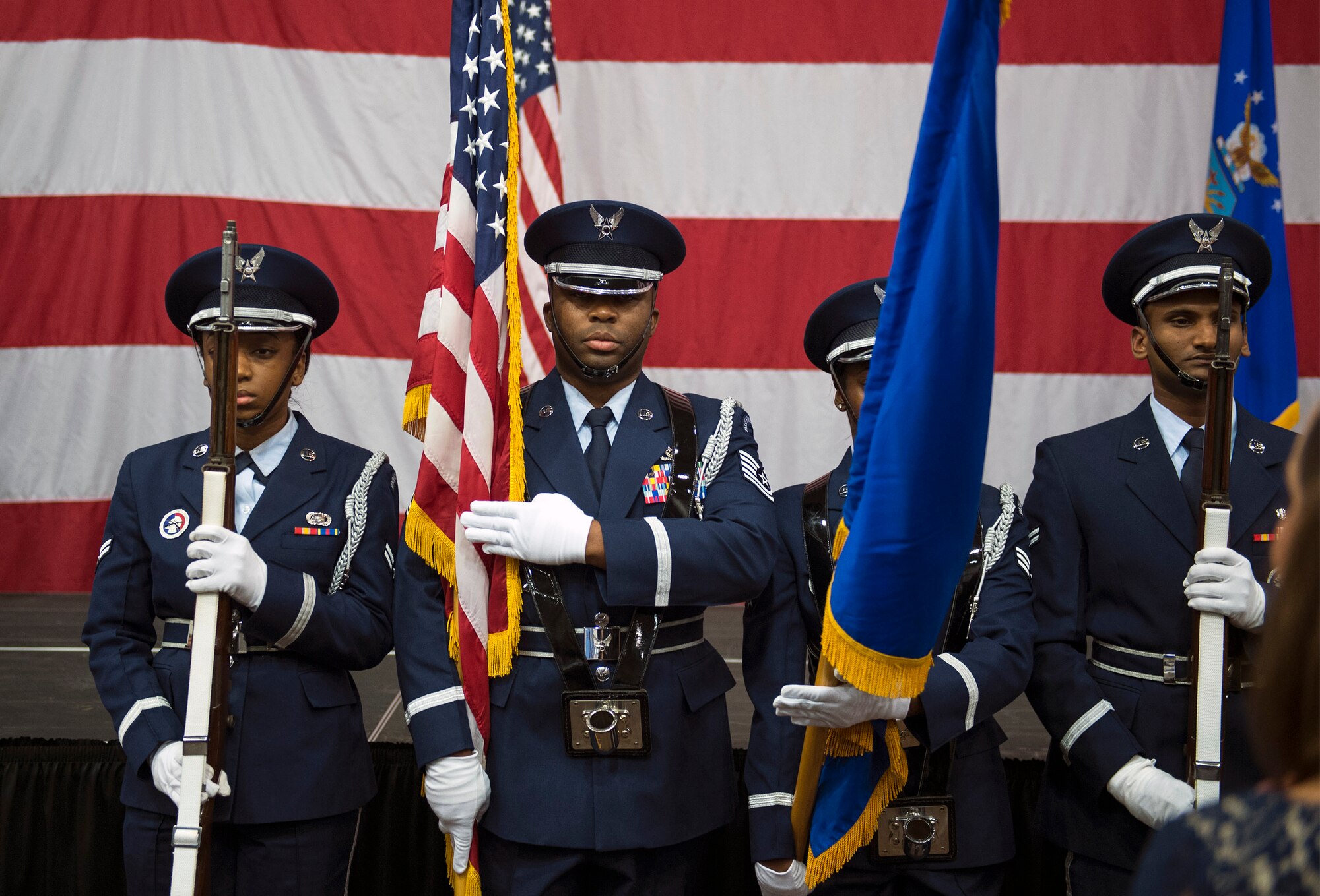 The Moody Air Force Base Honor Guard presents the colors during the 2016 Annual Awards Ceremony, Feb. 3, 2017, at Moody Air Force Base, Ga. During the ceremony, Airman 1st Class Ashley Stiegelmeier, 38th Rescue Squadron, sung the national anthem. (U.S. Air Force photo by Airman 1st Class Greg Nash)