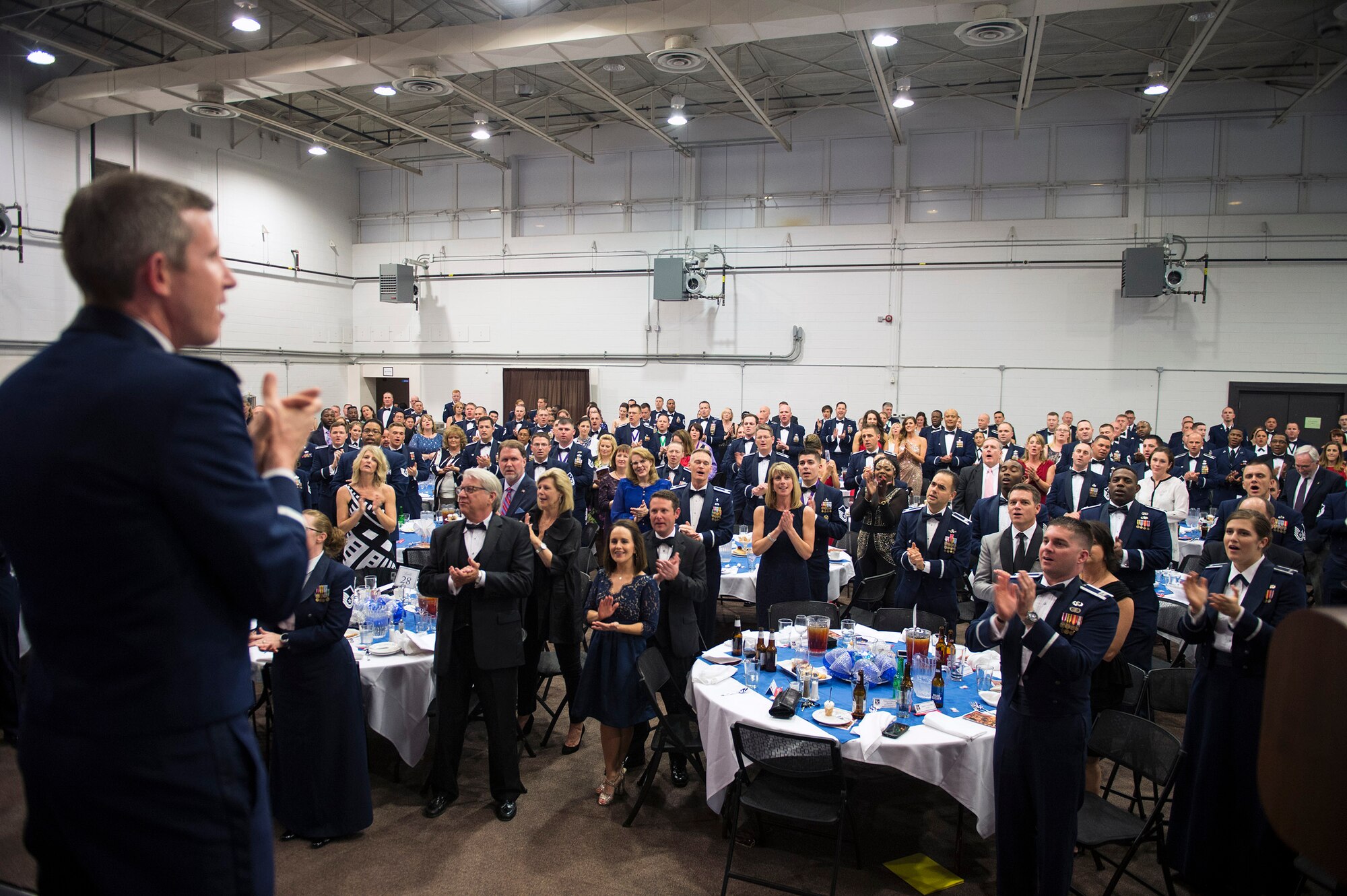 Moody Airmen, their families and loved ones sing the Air Force song during the 2016 Annual Awards Ceremony, Feb. 3, 2017, at Moody Air Force Base, Ga. The award winners were: Airman of the Year: SrA Clayton Smith (23 CES) NCO of the Year: TSgt Anthony Newman (23 MXG) SNCO of the Year: MSgt Demond Ingram (23 CES) CGO of the Year: Capt Sean Freitag (23 AMXS) FGO of the Year: Maj Erin Sturgell (23 MDOS) Civ Cat I of the Year: Mr. Keith Kuehn (23 FSS) Civ Cat II of the Year: Ms. Rhonda Olheiser (23 MSG) Honor Guardsman of the Year: A1C Megan McCully (23 OSS) First Sergeant of the Year: MSgt Jacqueline Hudson (23 SFS) Volunteer of the Year: SSgt Ryan Corvin (823 MXS) Key Spouse of the Year: Ms. Johaira Cruz (23 SFS) Dr. Lucy and Parker Greene Award: SSgt Denise Elzie (23 MXG) (U.S. Air Force photo by Airman 1st Class Greg Nash) 